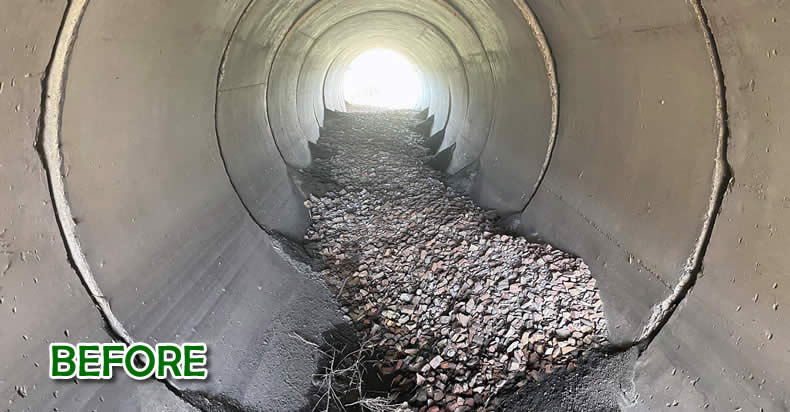 84 Inch Reinforced Concrete Pipe (RCP) with separated joints and noticeable voids.